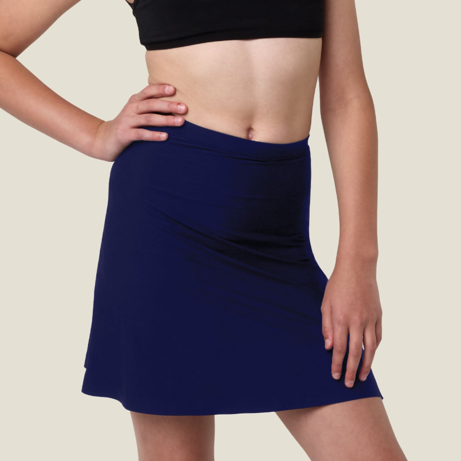 Close-up of navy WUKA Period Skort for teens — soft, stretchy waistband and smooth fit for heavy periods.