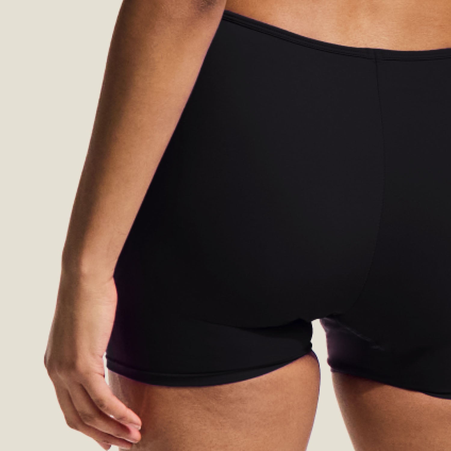 Close-up detail of WUKA Teen Swim Shorts showing secure stitching and high-performance fabric designed for leak-proof period protection.